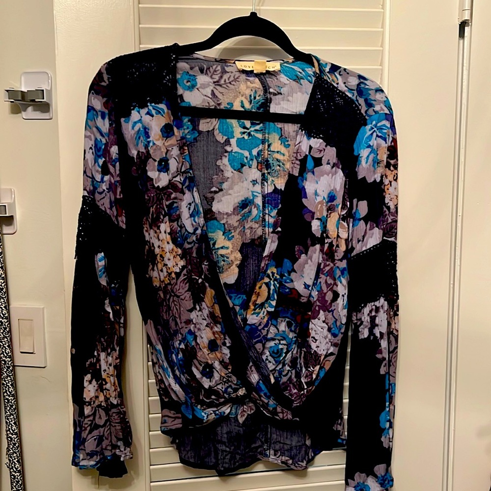 Navy blue floral blouse in size S